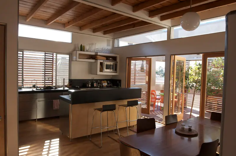 Bright open home kitchen with built-in appliances, the kind of space where we provide refrigerator repair